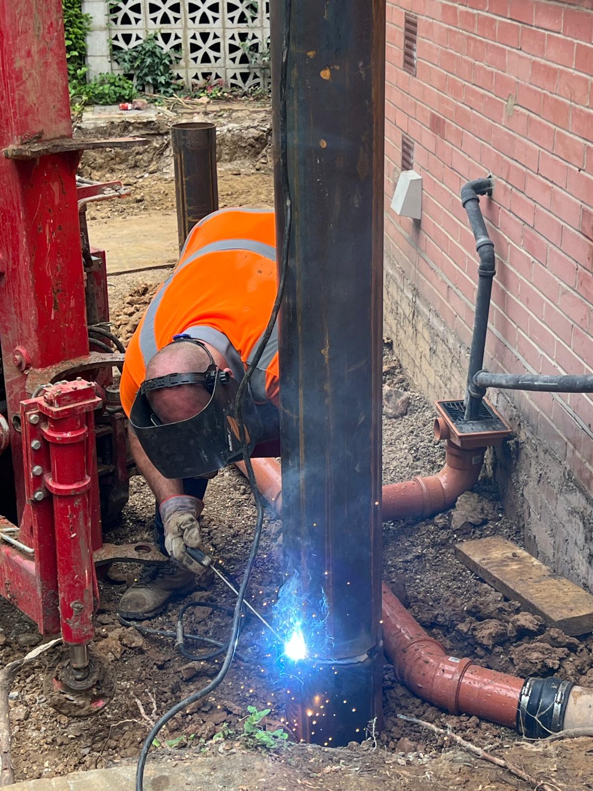 SCD steel-cased pile being welded on site